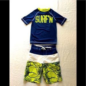 Swim trunks and short sleeve rashguard 🌊